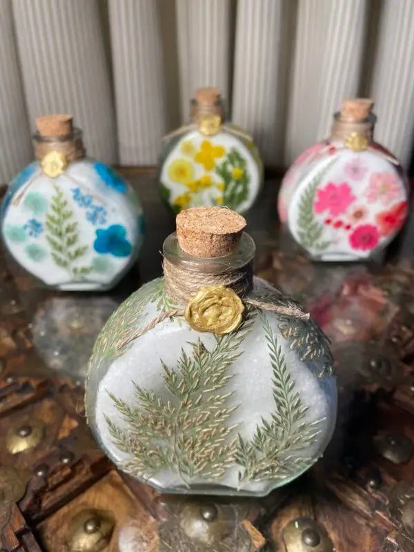 Glass round jar and epsom salts with pressed flower design