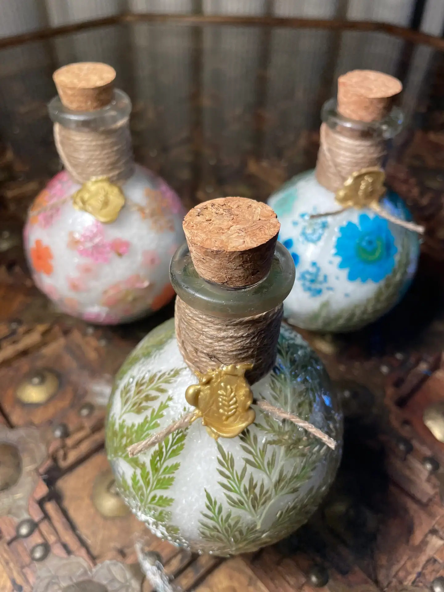 Glass ball jar of epsom salts with pressed flower design